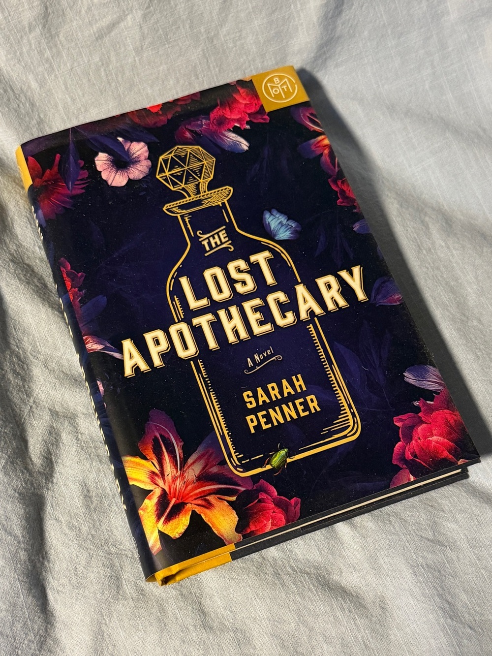 The Lost Apothecary by Sarah Penner - Dark Purple Floral Hardcover